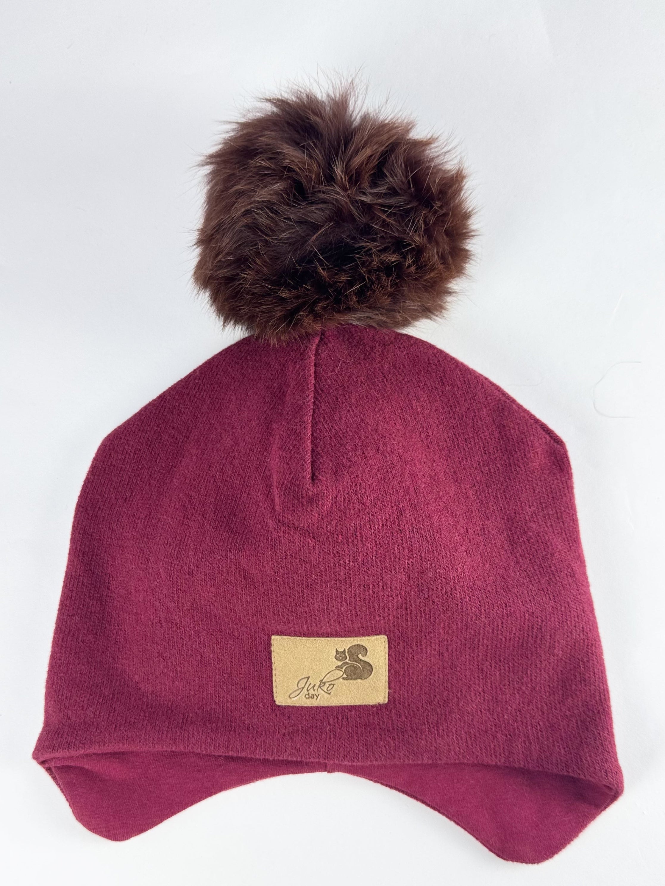 Vaikiška žieminė kepurė be raištelių, su vienu kailiniu bumbulu