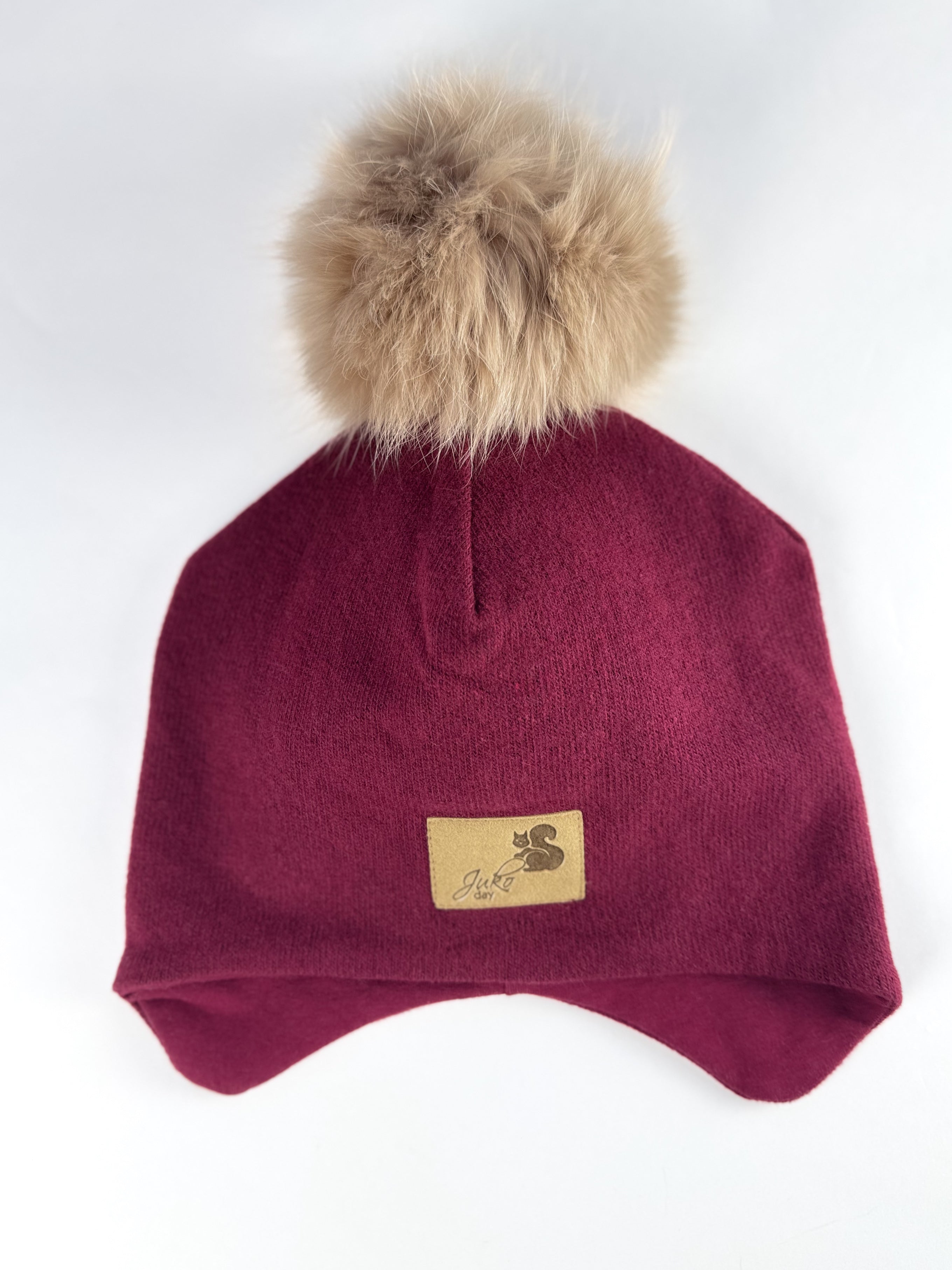 Vaikiška žieminė kepurė be raištelių, su vienu kailiniu bumbulu