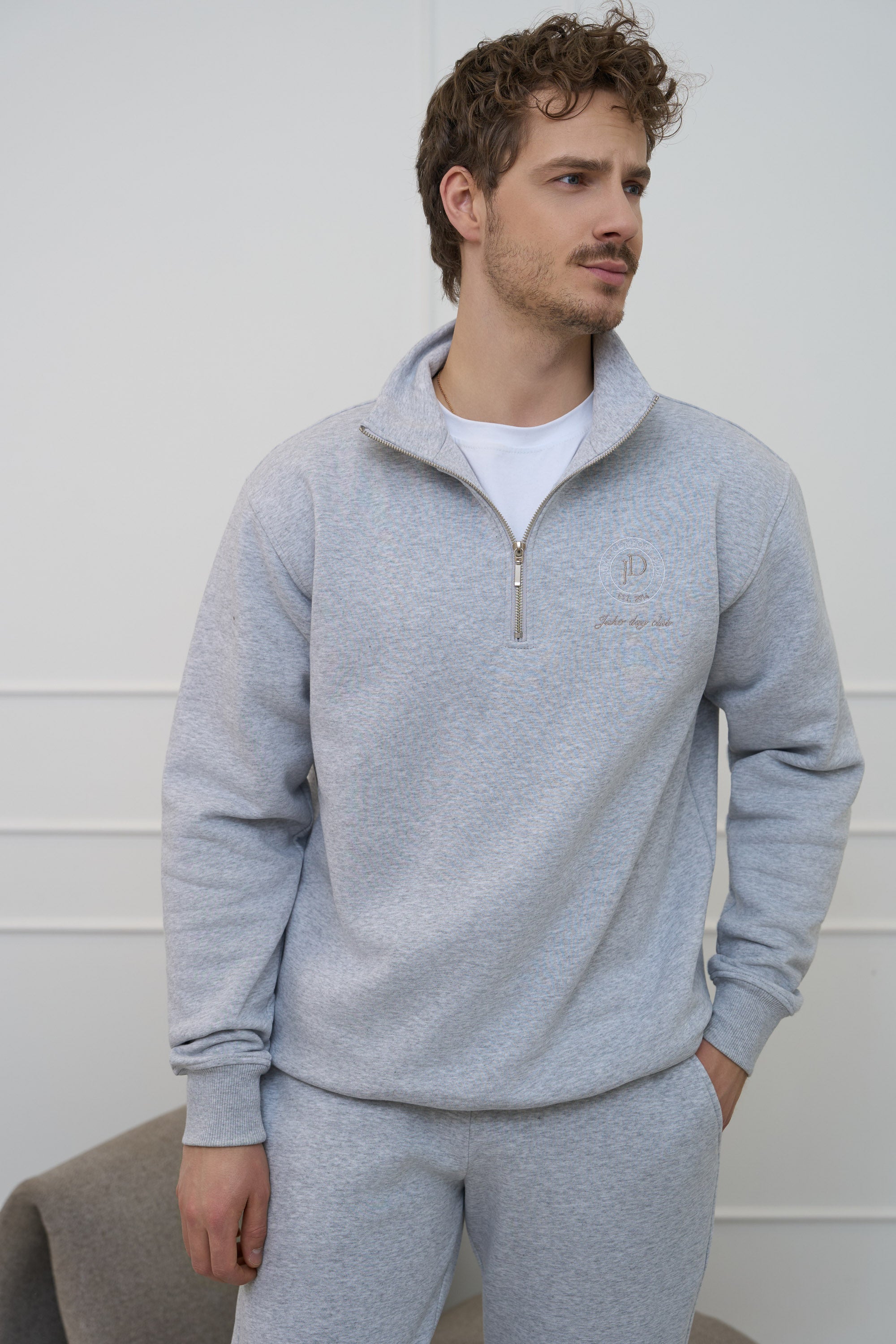 Šviesiai pilko melanžo spalvos džemperis vyrams | Su pusiniu užtrauktuku