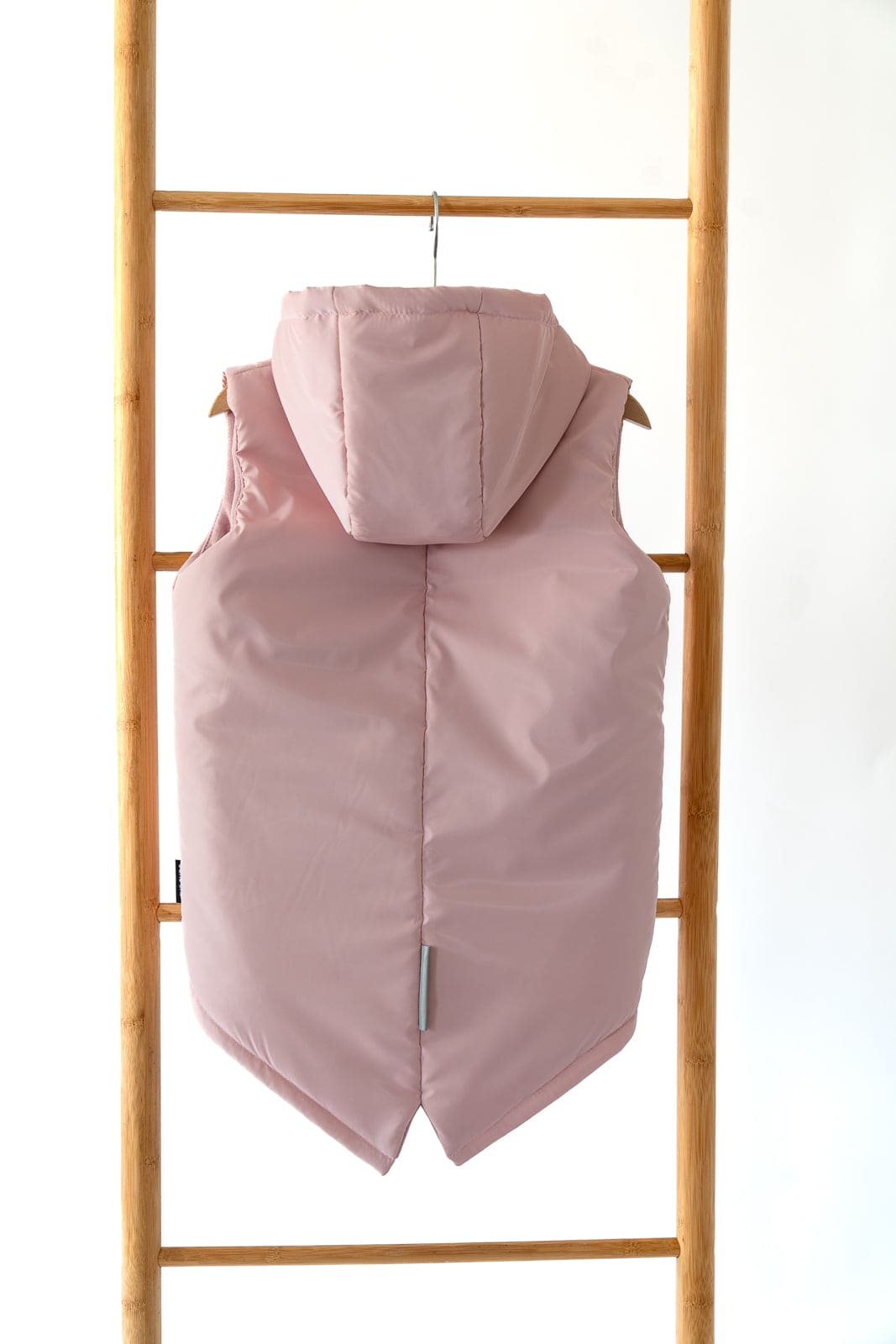 Gray children's vest with a hood
