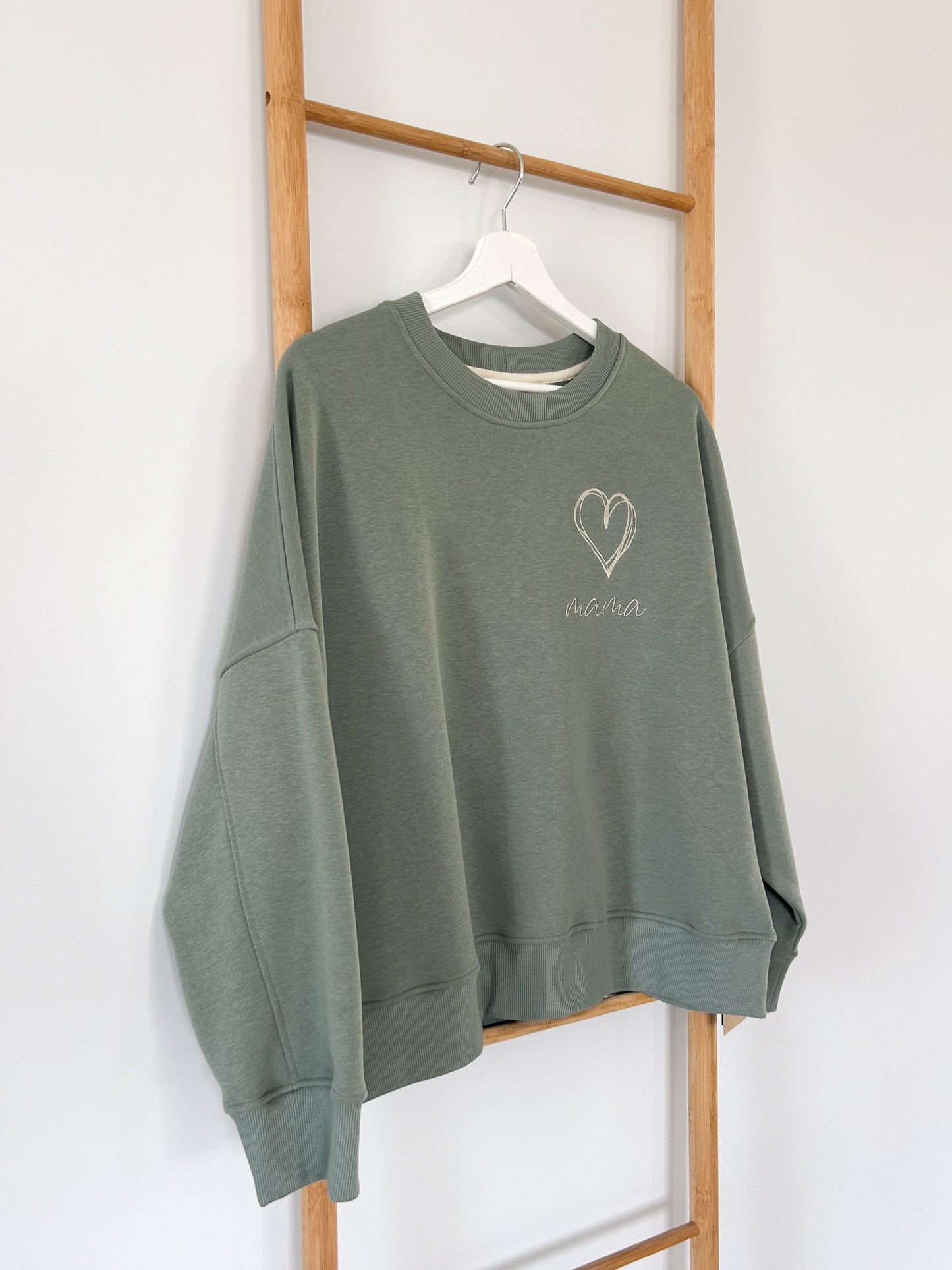 Pistachio-colored women's sweater "MAMA"