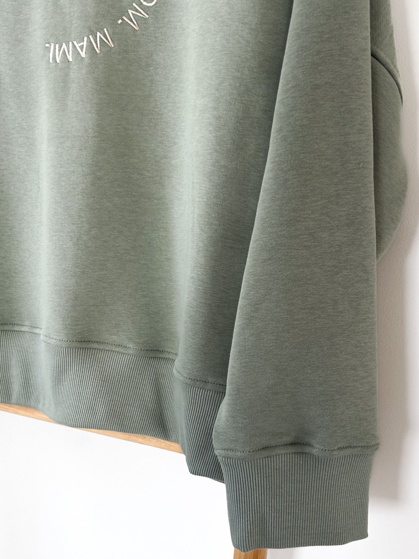 Pistachio-colored women's sweater "MAMA"