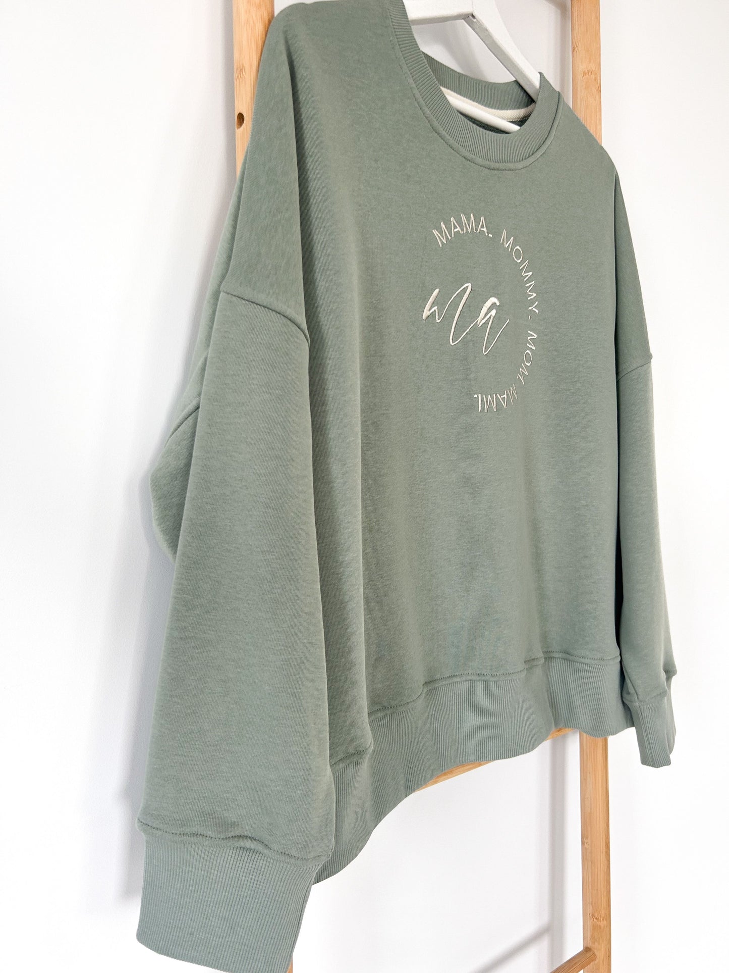 Pistachio-colored women's sweater "MAMA"