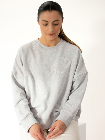 Pilko melanžo moteriškas megztinis "MAMA"