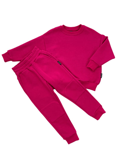Vaikiškas rožinis laisvalaikio kostiumėlis